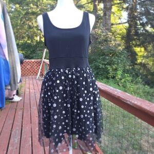 Black Sleeveless Dress with Polka Dot Skirt